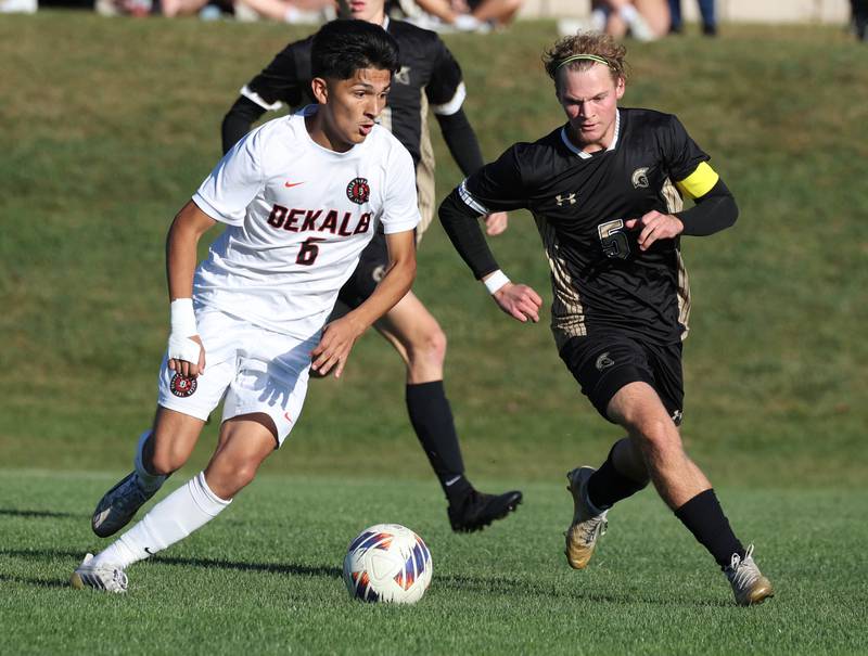 DeKalb's Mauricio Jasso tries to get a shot off in front of Sycamore's Aiden Sears during the El Classicorn rivalry game Tuesday, Oct. 7, 2025, at Sycamore High School.