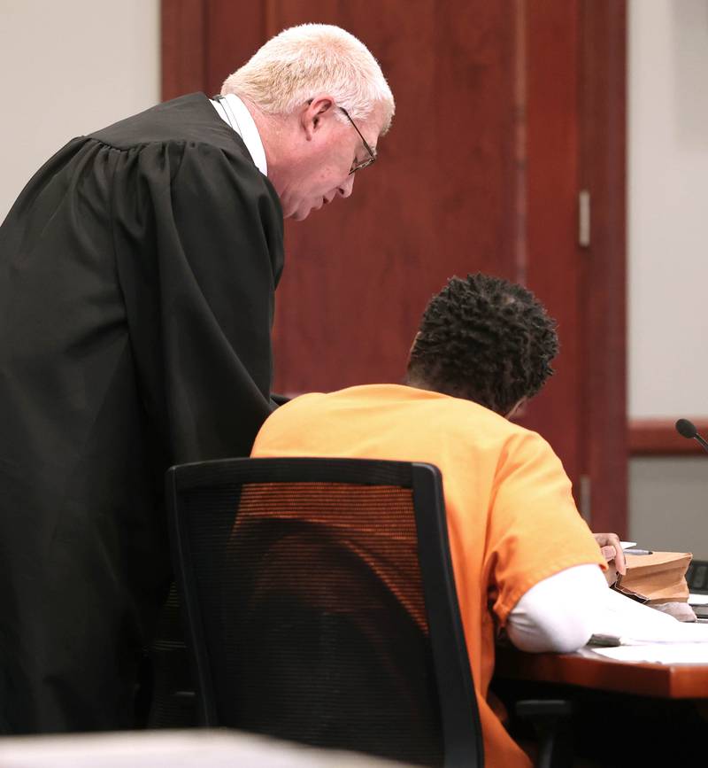 Matthew L. Martin and Circuit Court Judge Philip Montgomery talk during a pretrial hearing Thursday, April 3, 2025, at the DeKalb County Courthouse in Sycamore. Martin is charged with robbing a DeKalb bank in July 2024.