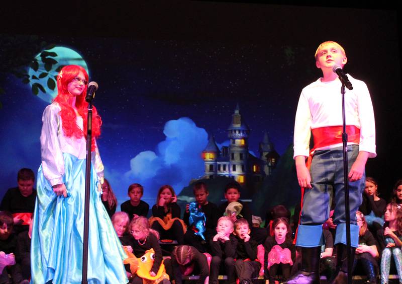 Ariel (Piper Brandenburg) and Prince Eric (Mason Moore) share a moment during the Streator Elementary Schools production of "The Little Mermaid Jr." Friday, May 5, 2023, at the Streator High School Auditorium.