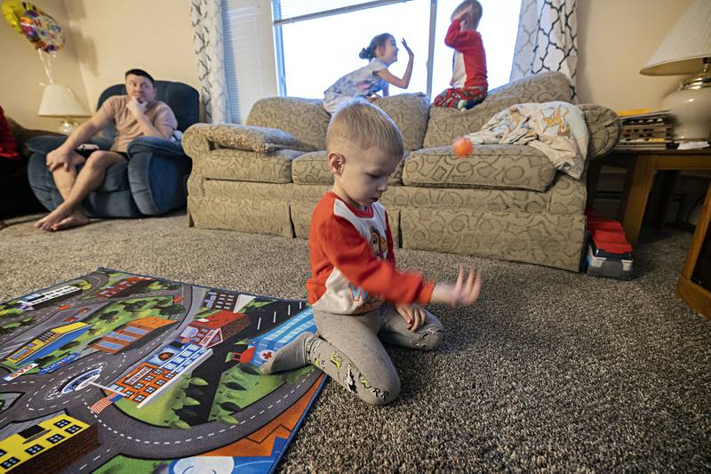 Roman, 3, plays in the family’s apartment in Dixon. Roman and brother Bohdon are twins.