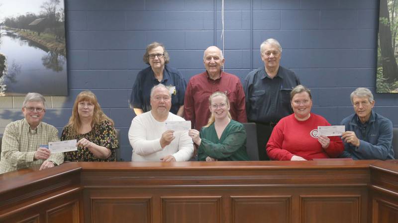 The Utica Knights of Columbus donated $2,600 to four local charities in the Illinois Valley on Thursday, March 18, 2026 at the Utica Village Hall. Gathered for the check presentation were (front from left) Ed Brown grand knight, Alice Buczkowski, administrative assistant for Horizon House, trustee Greg Anderson, Samantha McKee- Fundraising and Marketing Coordinator at Starved Rock Regional Center, Alicia Hughes Lighted Way assistant director of development, and Steve Harmon. (Back from left) Utica Knights of Columbus members Mike Brown, John Koehler, and Chuck Vorelis. Absent was Special Olympics. The money was donated through The Knights of Columbus Intellectual Disabilities Fund Drive, commonly known as the Tootsie Roll Drive, last October. The fund drive supports local programs for people with special needs. Each organization received $650.