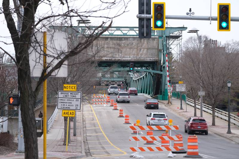 Traffic moves along the Cass Street draw bridge. Friday, Mar. 4, 2022, in Joliet.