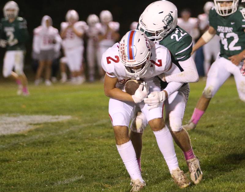 Ottawa's Andrew Vercolio is taken down by St. Bede's Ryan Nawa on Friday, Oct. 25, 2024 at St. Bede Academy.