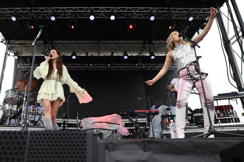 Tae Dye, left, and Maddie Marlow of Maddie & Tae perform on day 2 of the Taste of Joliet. Saturday, June 25, 2022 in Joliet.
