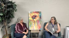 Sherwin-Williams volunteers refresh staff lounge at Morris Area Public Library