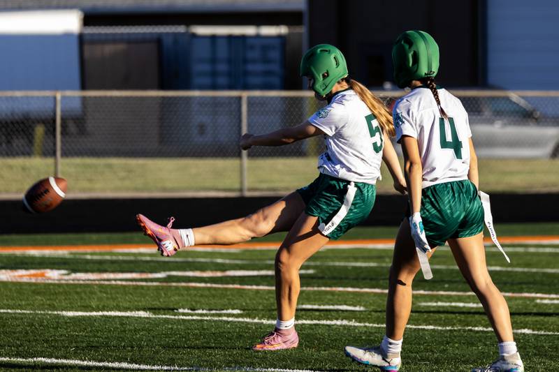 Plainfield Central's Delilah Leanos kicks during a varsity flag football Romeoville Regional semifinal game against Bradley-Bourbonnais at Romeoville on Oct. 7, 2025.