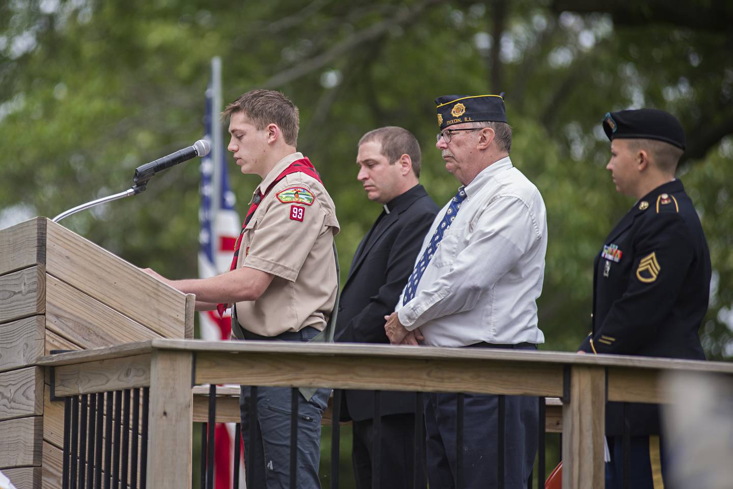 Noah Hage of Scout Troop 93 reads General Logan's orders Monday morning during the recognition of Memorial Day in Dixon.