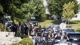 Manhunt for three in fatal shooting of Fox Lake officer