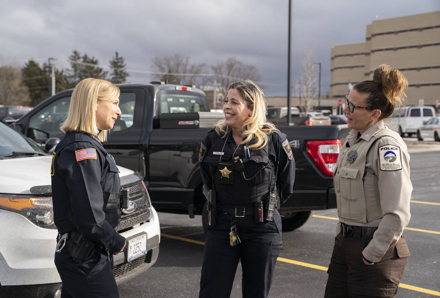 McHenry County has three female police chiefs that include, left to right, Mary Frake, Chief of Police, Lake in the Hills Police Department, Juanita Gumble, Chief of Police, Hebron Police Department and Laura King, Chief of Police, McHenry County Conservation District Police, photographed outside the McHenry County Government Center on Thursday, March 2, 2023 in Woodstock. Ryan Rayburn for Shaw Local