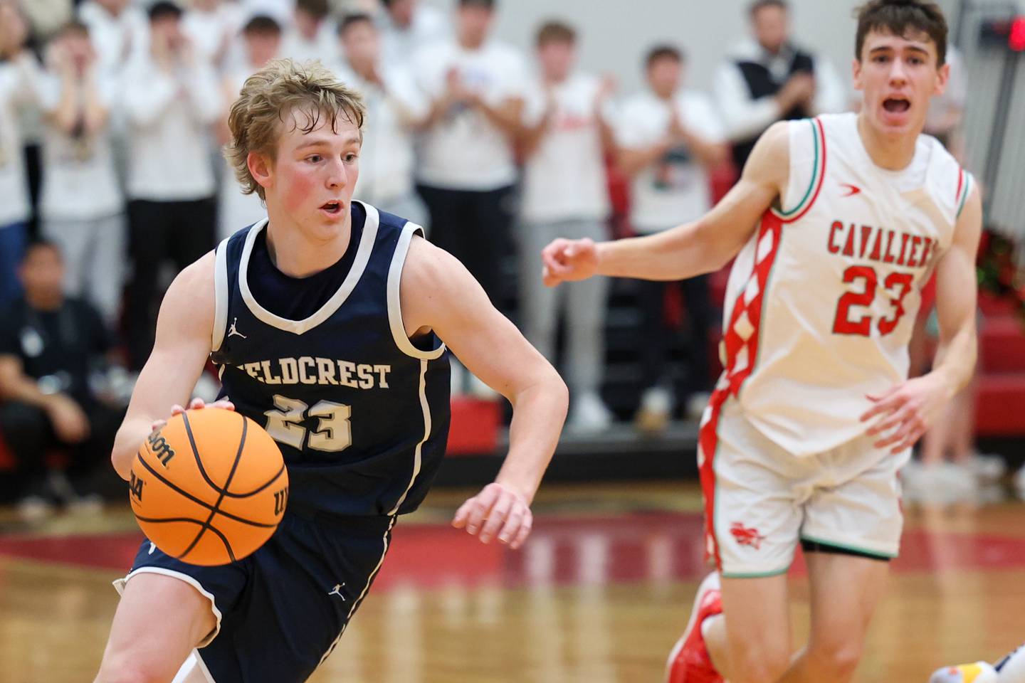 Jordan Heider of Fieldcrest dribbles ball on Saturday, December 14, 2024 at Hall High School in Spring Valley.