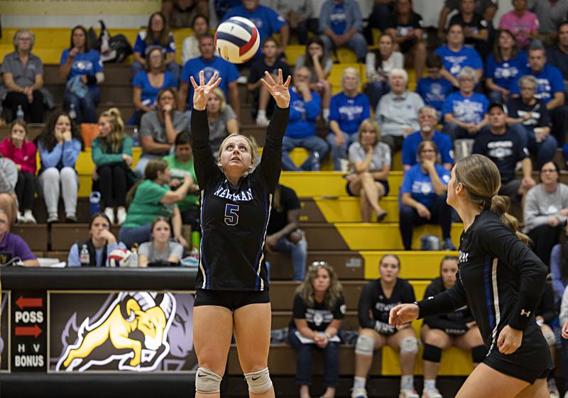 Newman’s Molly Olson sets the ball against Erie-Prophetstown Tuesday, Oct. 24, 2023 at the Riverdale volleyball regional.