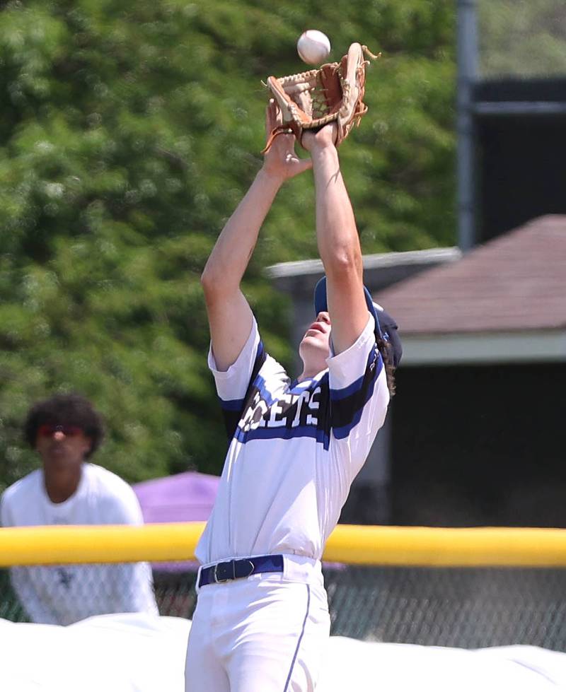 Burlington Central's Matt Lemon catches a fly ball in foul territory during their Class 3A sectional final game against Sycamore Saturday, June 3, 2023, at Kaneland High School in Maple Park.