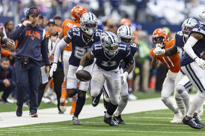 Dallas Cowboys linebacker Micah Parsons recovers a Chicago Bears fumble during the second half, Sunday, Oct. 30, 2022, in Arlington, Texas.