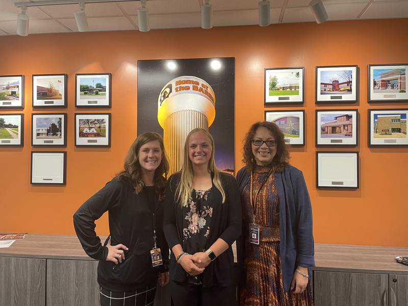 Donna Larson (left), Jenna Zimmerman and Minerva Garcia-Sanchez (right) pose for a picture.