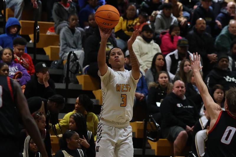 Joliet West’s Tristian Saunders puts up the outside shot against Bolingbrook on Friday, Jan 24, 2025 in Joliet.