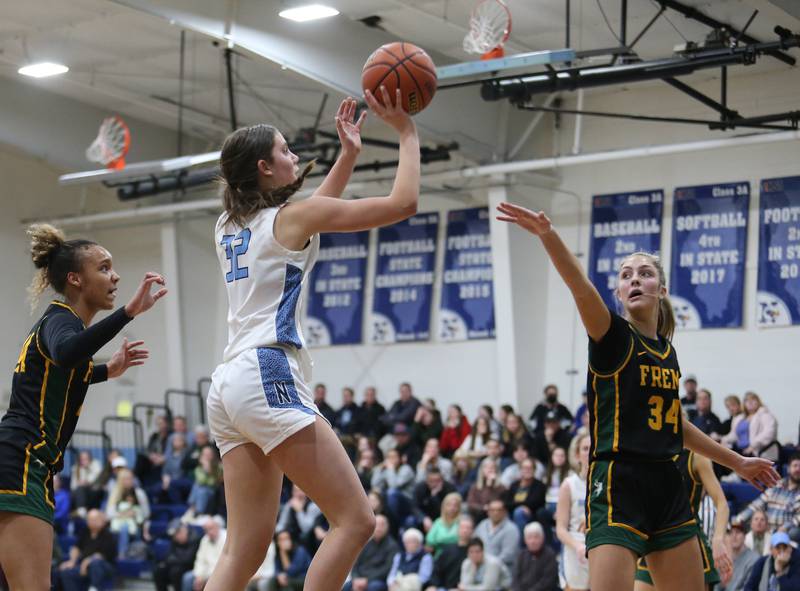 Nazareth's Stella Sakalas (32) takes a jump shot during the girls varsity basketball game between Fremd and Nazareth on Monday, Jan. 9, 2023 in La Grange Park, IL.