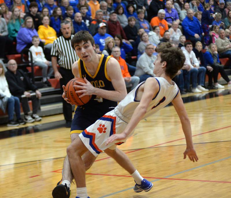 Polo's Brock Soltow gets called for an offensive foul as an Eastland player falls to the ground on Friday, Feb. 23, 2024 at the 1A Forreston Regional championship game at Forreston High School.