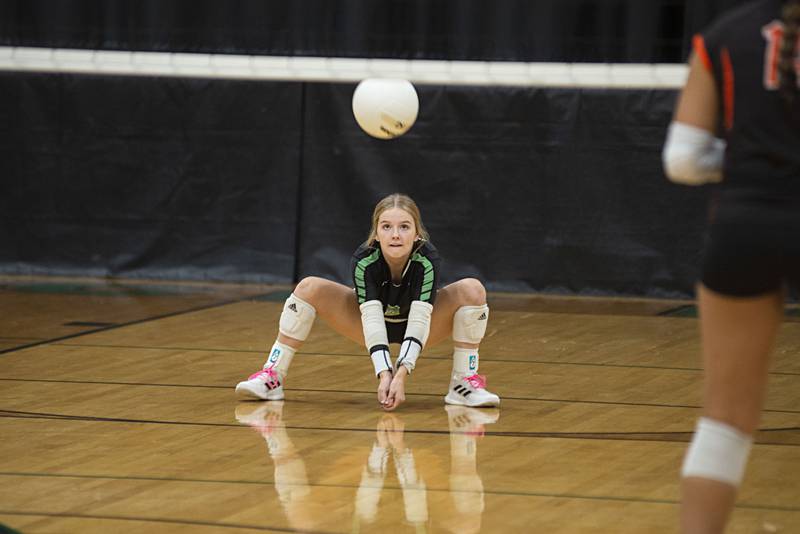Rock Falls’ Zoe Henson goes down to play a ball against Winnebago Tuesday, Sept. 27, 2022.