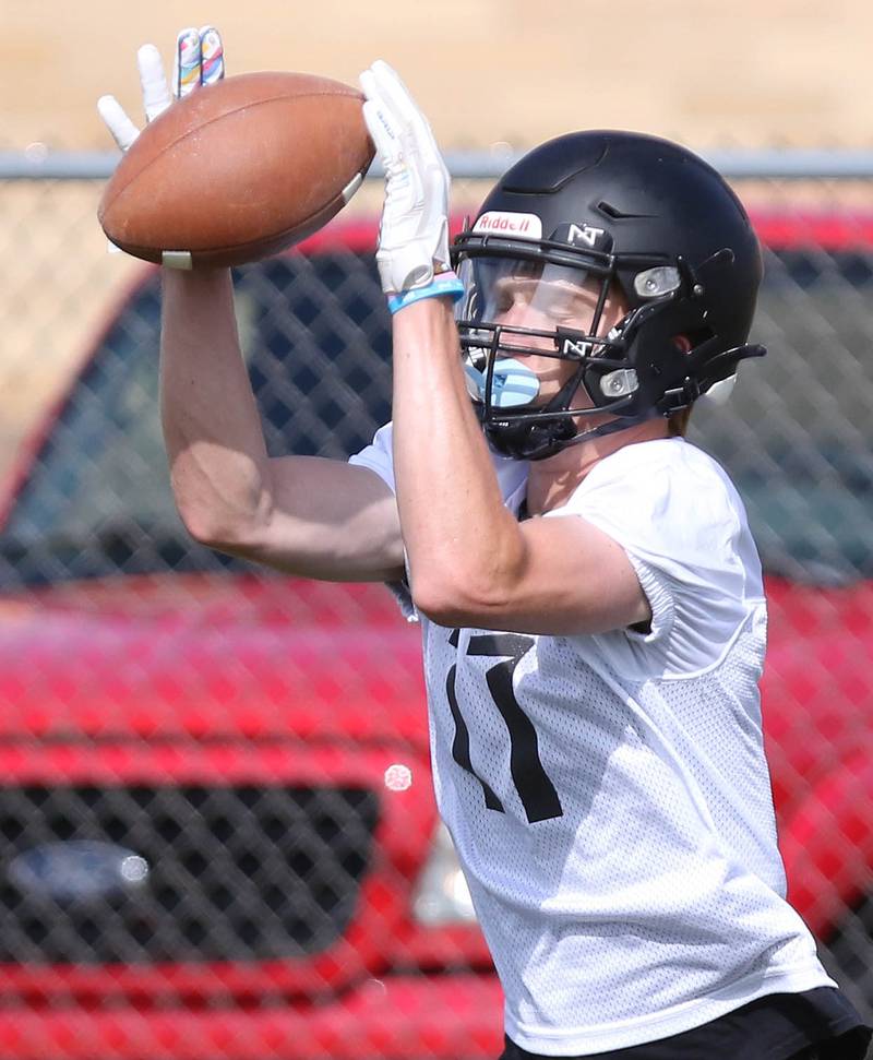 A Sycamore receiver makes a catch during practice Monday, Aug. 7, 2023, at Sycamore High School.