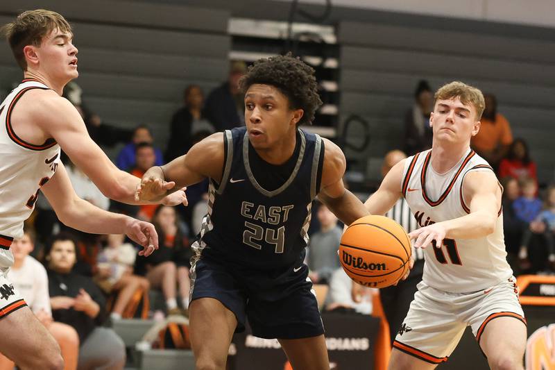 Oswego East’s Dshaun Bolden looks to make a play against Minooka on Friday, Jan. 16, 2026 in Minooka.