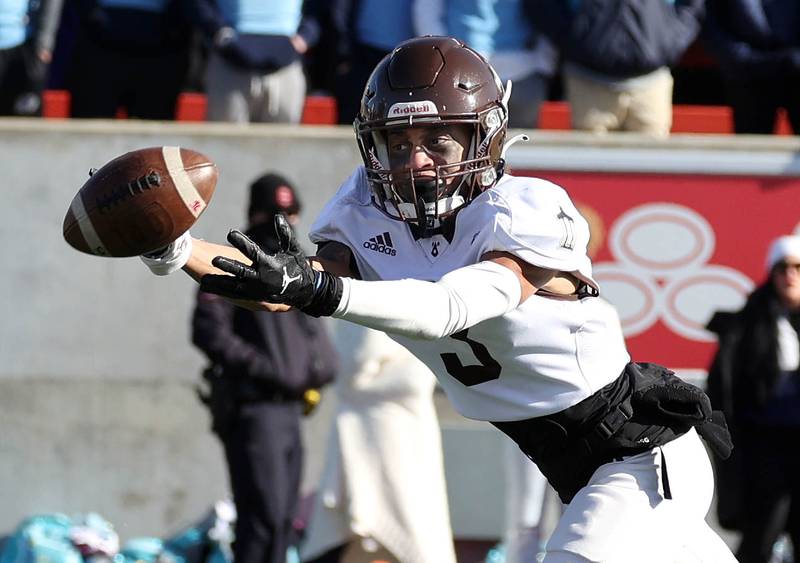 Joliet Catholic's Adrian Washington gets behind the Nazareth defense but the pass is just out of reach Saturday, Nov. 25, 2023, during their IHSA Class 5A state championship game in Hancock Stadium at Illinois State University in Normal.