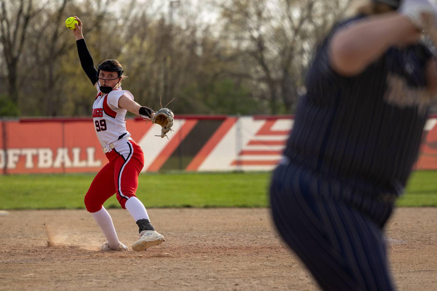 Makenna Ondrey (99) of Streator pitches on Wednesday, April 16, 2025 at Streator High School in Streator.