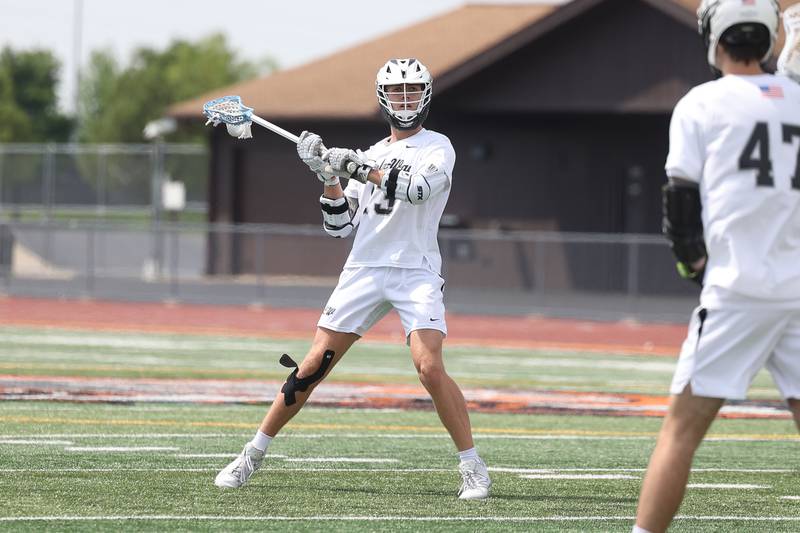 Lincoln-Way’s Matthew Konow passes against Oak Forest on Saturday, May 4, 2024 at Lincoln-Way West in New Lenox.