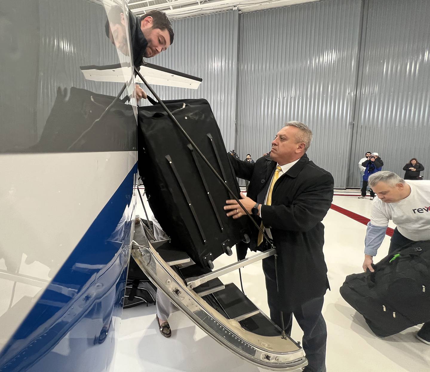 City of Aurora Deputy Mayor Guillermo Trujillo loads up bags of supplies that include toiletries, combat gear that includes tourniquets, medical supplies and crutches which will be flown to John F. Kennedy International Airport in New York City then on to Poland for the Ukrainian refugees.
