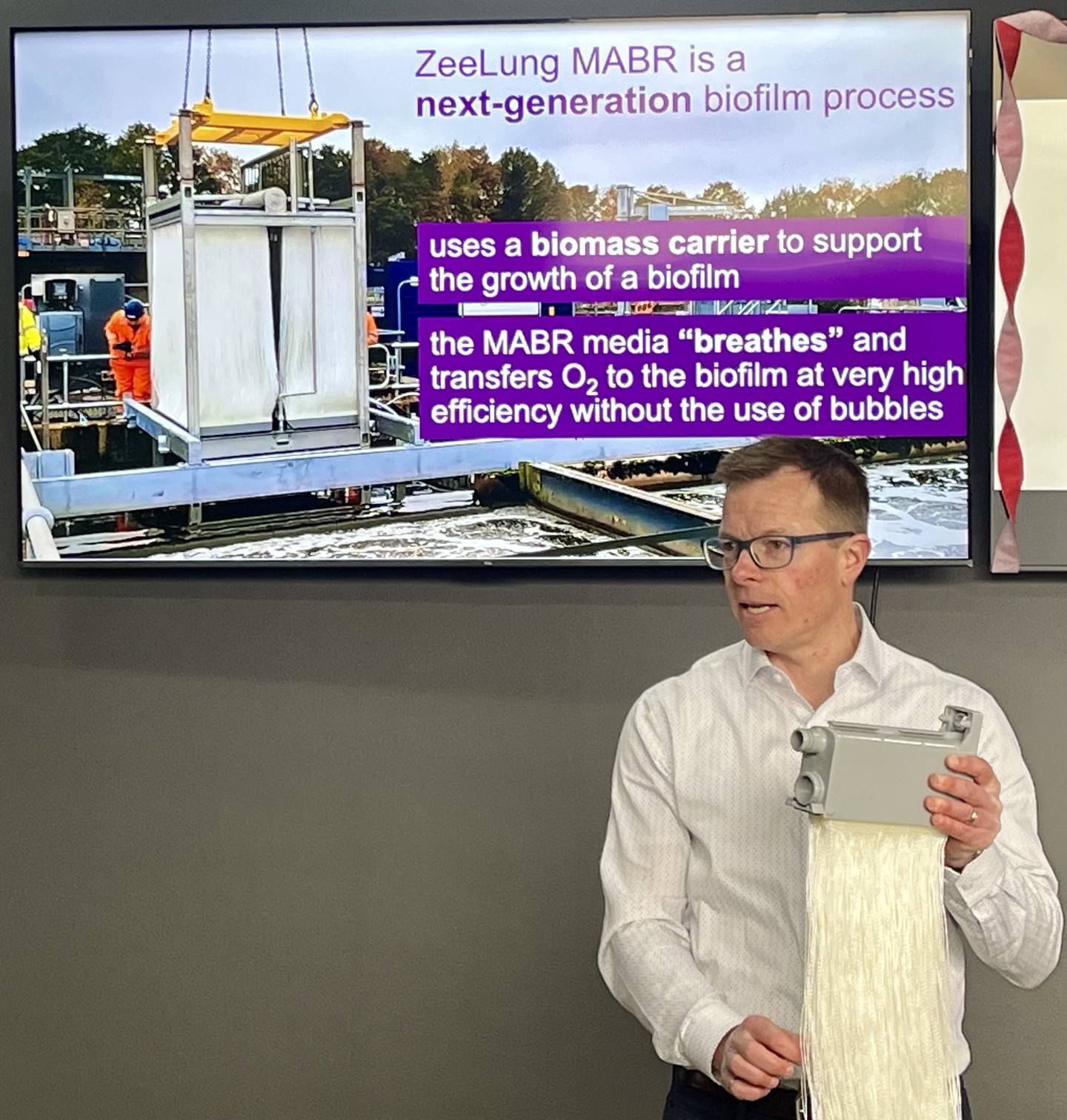 Jeff Peeters, innovation and incubation leader with Veolia Water Technologies & Solutions shows off the new tech, the  ZeeLungMABR, that the Yorkville-Bristol Sanitary District installed in their wastewater treatments tanks to help the facility increase efficiency, saving $19 million in expansion costs.