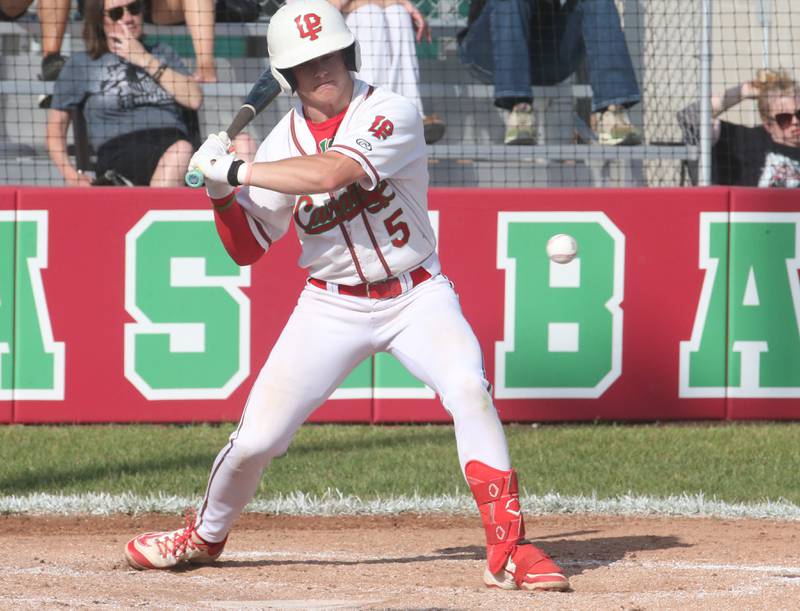 L-P's Brevyn Vogel watches strike three come across the plate in front of him while playing Kaneland on Tuesday, May 13, 2025 at Huby Sarver Field at the L-P Athletic Complex in La Salle.
