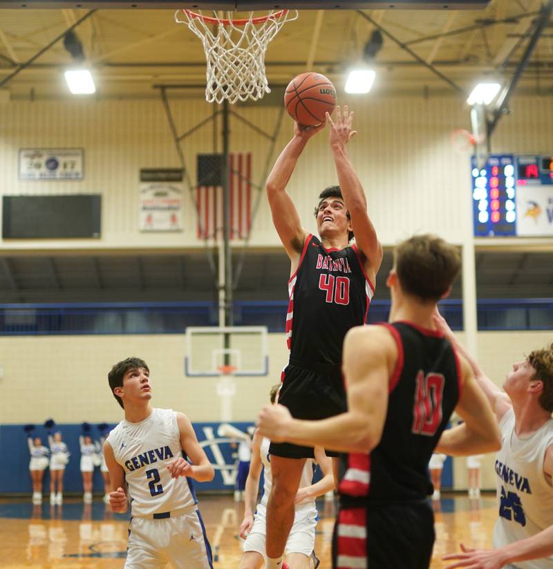 Batavia’s C.J. Valente (40) shoots the ball in the post against Geneva during a basketball game at Geneva High School on Friday, Dec 15, 2023.