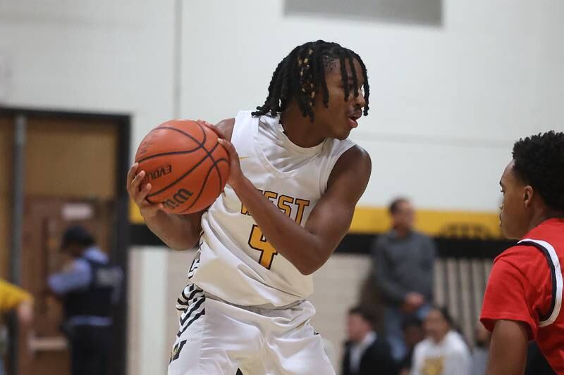 Joliet West’s Brilan Townsend looks for a play against Yorkville on Friday, Jan. 5th, 2024. in Joliet.