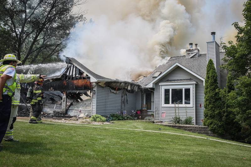 A house was deemed a total loss, with over $300,000 in damages, after a structure fire in Crystal Lake.