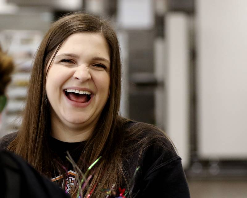 Teacher Leah Pelletier talks with student Cooper Ten Bruin on Friday, April 28, 2023, at McHenry High School.