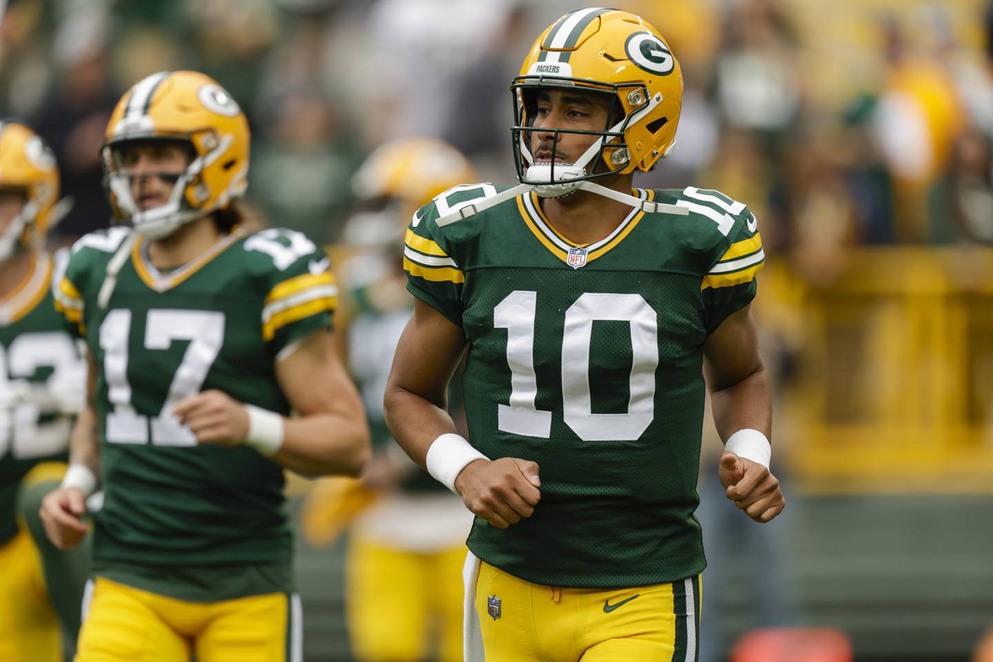 Green Bay Packers quarterback Jordan Love (10) runs onto the field during a preseason NFL football game between the Green Bay Packers and Seattle Seahawks Saturday, Aug. 26, 2023, in Green Bay, Wis.