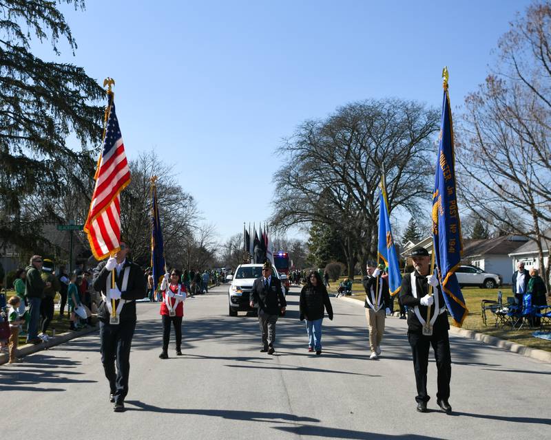 The La Grange American Legion Post 1941 presents the colors to kick of the Countryside St. Patrick Day parade on Saturday March 2, 2024.