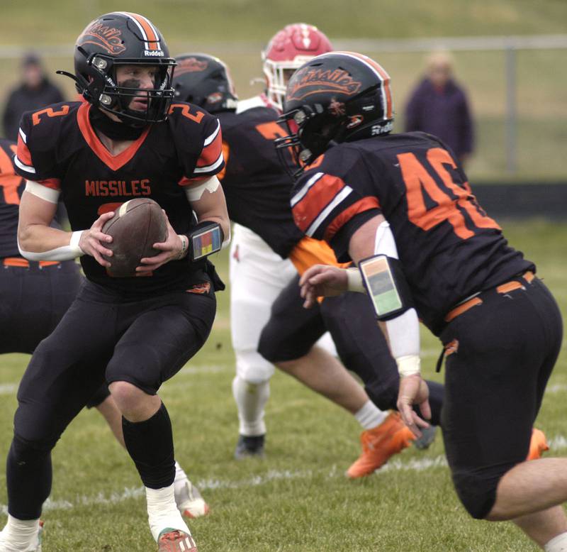 Milledgevilles's Kyson Francis  gets ready to hanoff to Spencer Nye. The Milledgeville Missiles defeated the South Beloit SoBos 22-6 in Round 2 of the I8FB playoffs. The game took place at Milledgeville on Saturday, November 8th, 2025