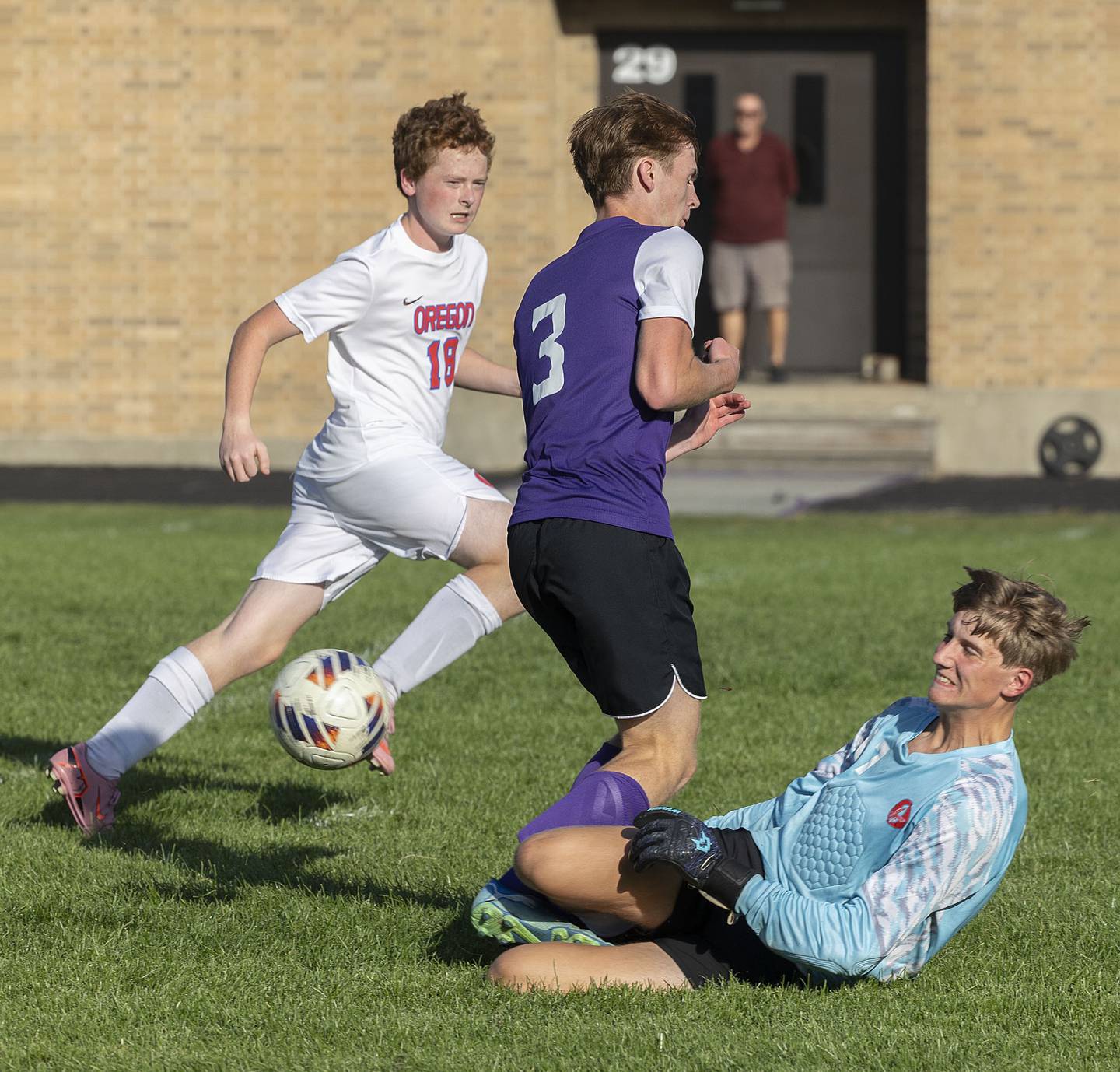 Oregon GK Deryk Withers makes a slide tackle on Dixon’s Dylan Osmer Monday, Sept. 29, 2025.