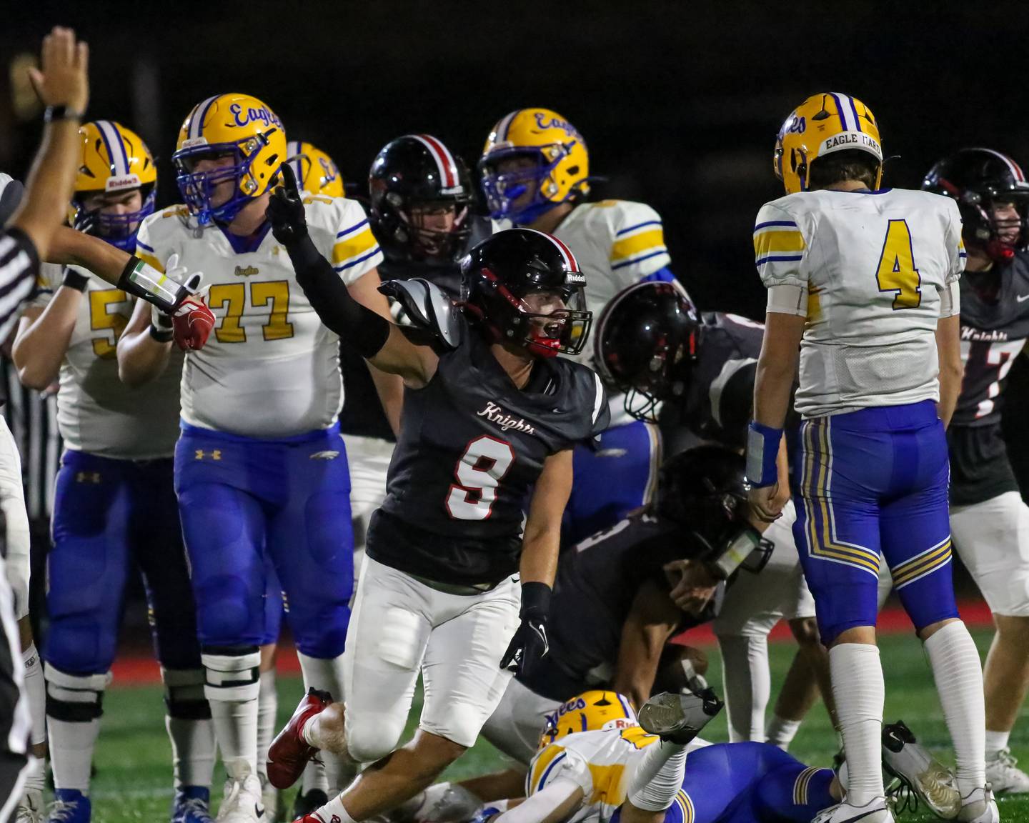 Lincoln Way Central's Nick Mitcheff (9) celebrates a sack during football game between Sandburg at Lincoln Way Central.  Sept 22, 2023.