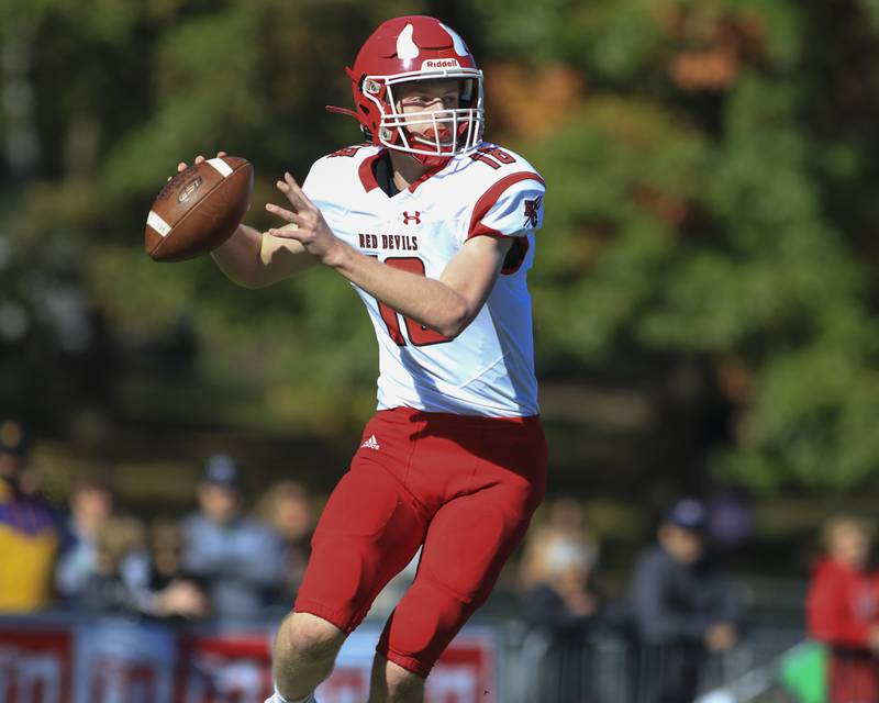 Hinsdale Central's Billy Cernugel (18) looks down field during football game between Hinsdale Central at Glenbard West. Oct 23, 2021.