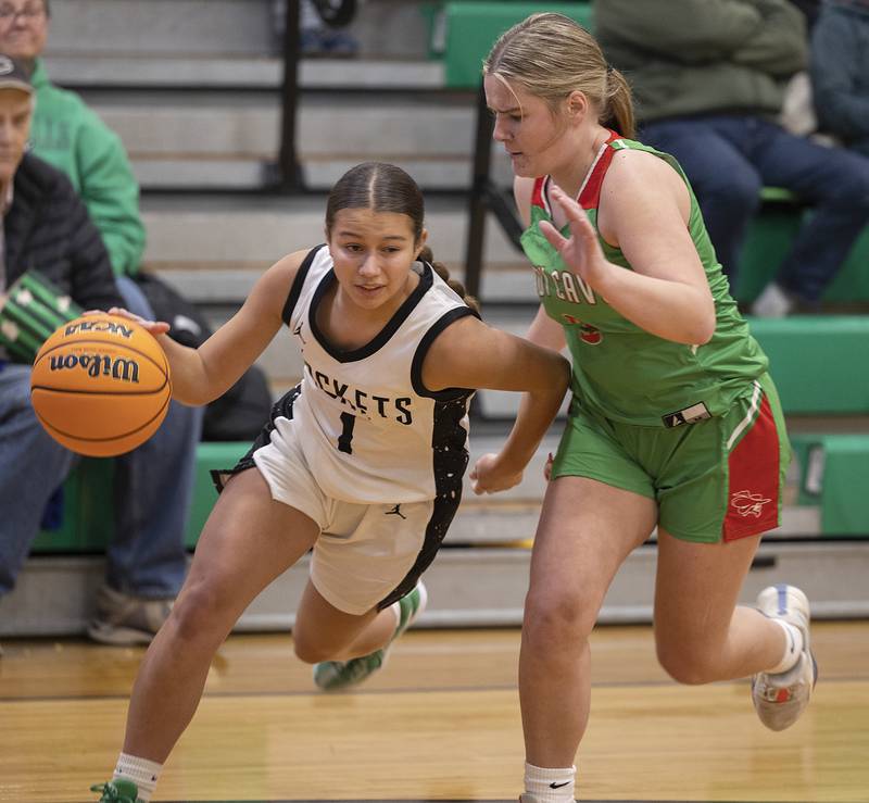 Rock Falls’ Elizabeth Lombardo drives to the hoop against L-P’s Emma Jerub Saturday, Nov. 30, 2024.