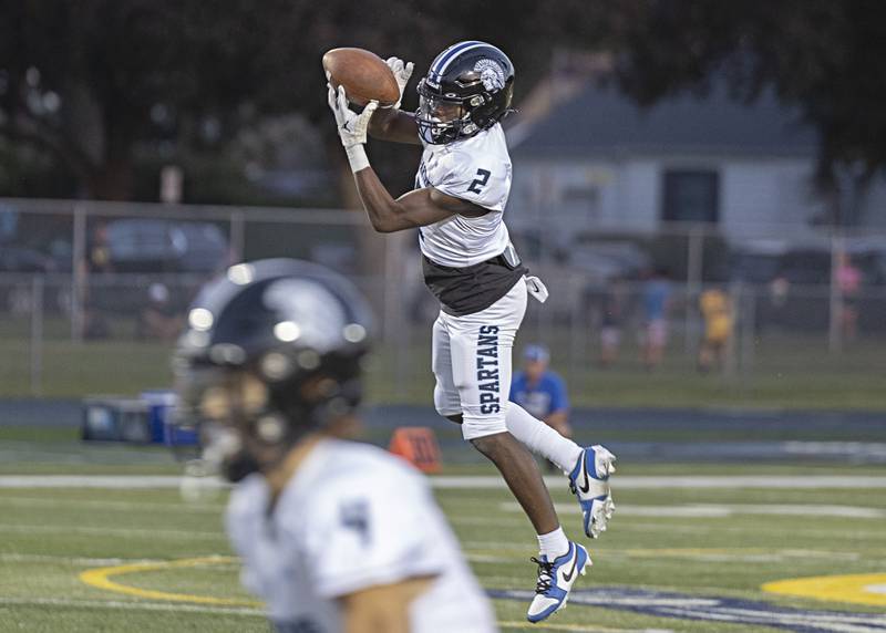 St. Francis’ Ian Willis makes the catch against Sterling Friday, Sept. 1, 2023 at Sterling High School.