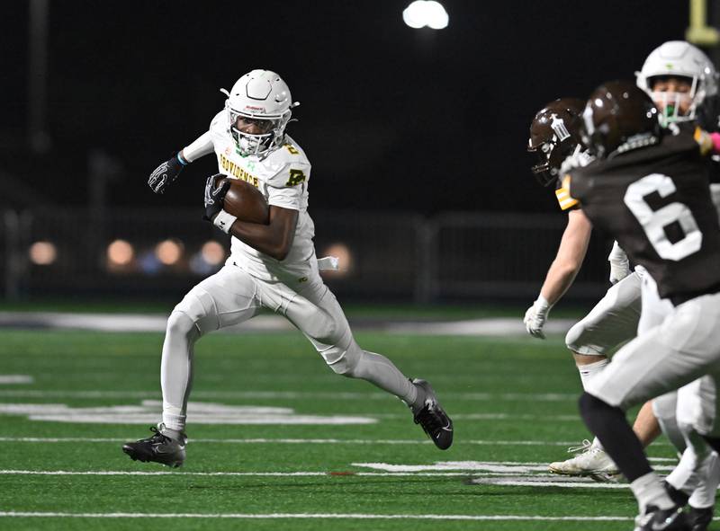 Providence Catholic's Xavier Coleman (2) runs the ball during the conference game against Joliet Catholic on Friday, OCT. 24, 2025, at Joliet.