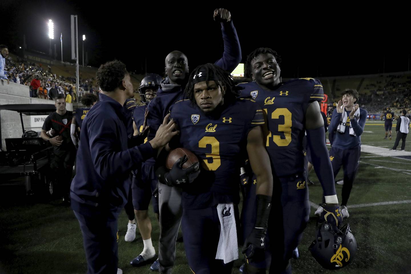 California safety Elijah Hicks celebrates with teammates after an interception against Oregon State on Oct. 30, 2021 in Berkeley, Calif.