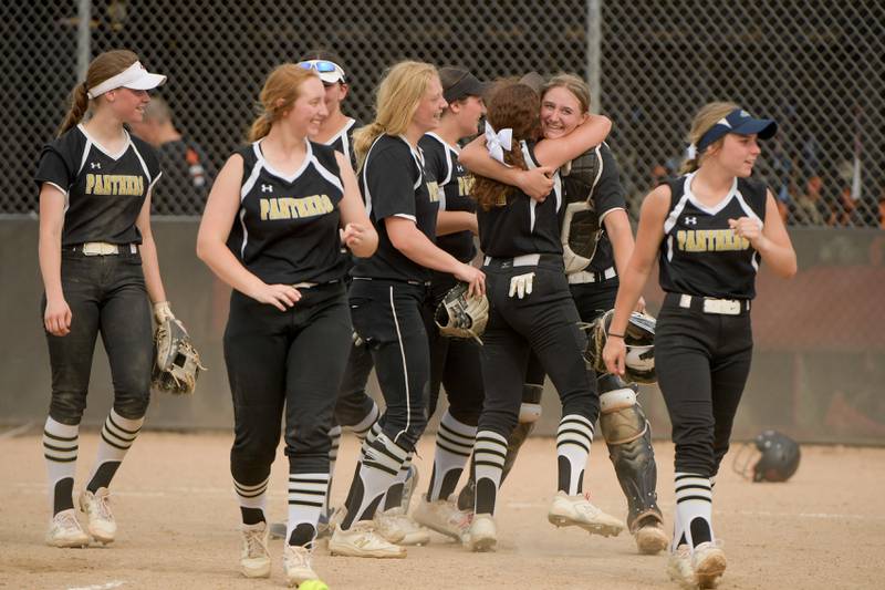 Glenbard North celebrate their 5-4 win over St. Charles East during the Class 4A St. Charles East Sectional semifinal on Tuesday, May 31, 2022.