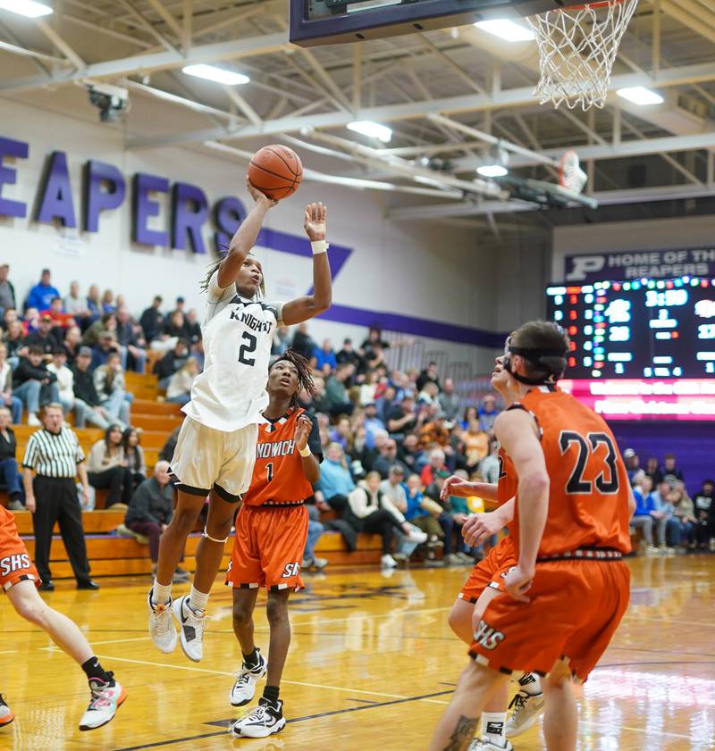 Photos Kaneland vs. Sandwich boys basketball in the 60th Plano