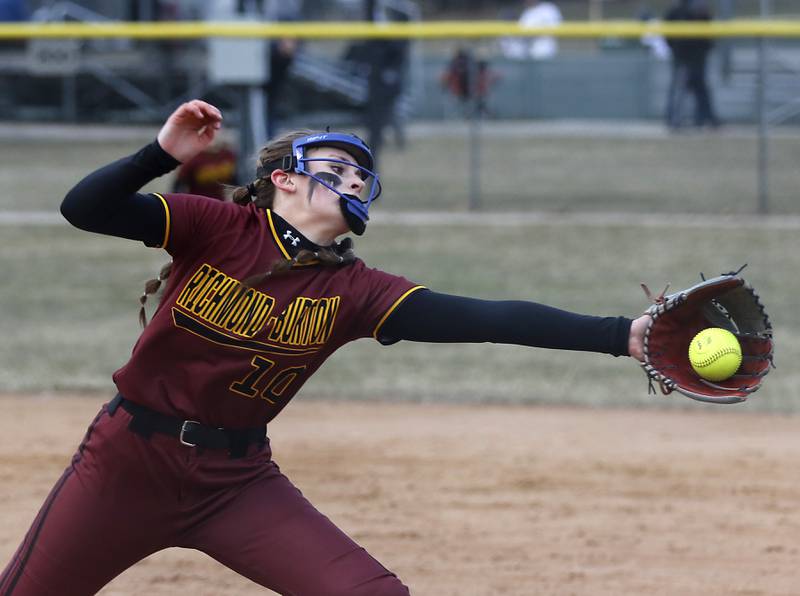 Richmond-Burton’s Hailey Holtz tries to catch the ball during a non-conference softball game against Cary-Grove Tuesday, March 21, 2023, at Cary-Grove High School.