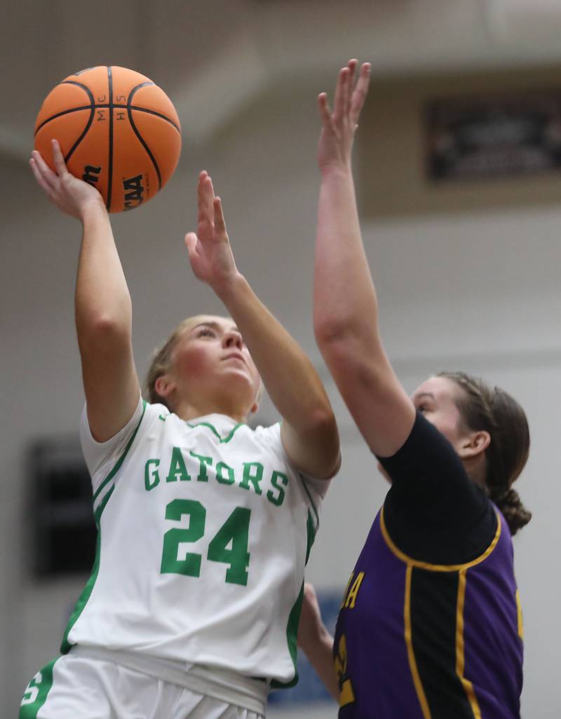 Crystal Lake South's Gracey LePage drives to the basket against Wauconda's Kelsey Piehl during the Northern Illinois Holiday Classic Championship girl basketball game on Thursday, Dec. 18, 2025, at McHenry High School.
