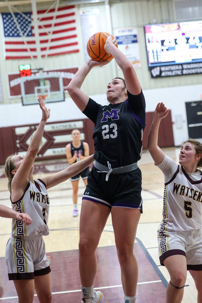 Manteno's Maddie Gesky goes for a layup past Watseka/Milford's Kyah Westerfield, right, and Kami Muehling during Manteno's 57-52 victory on Wednesday, Jan. 21, 2026.