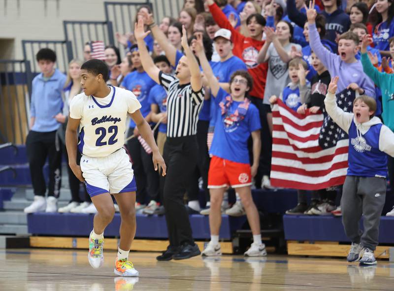 Riverside Brookfield's Steven Brown (22) looks back after his three-point shot as the crowd cheers during the boys varsity basketball game between IC Catholic Prep and Riverside Brookfield in Riverside on Tuesday, Jan. 24, 2023.